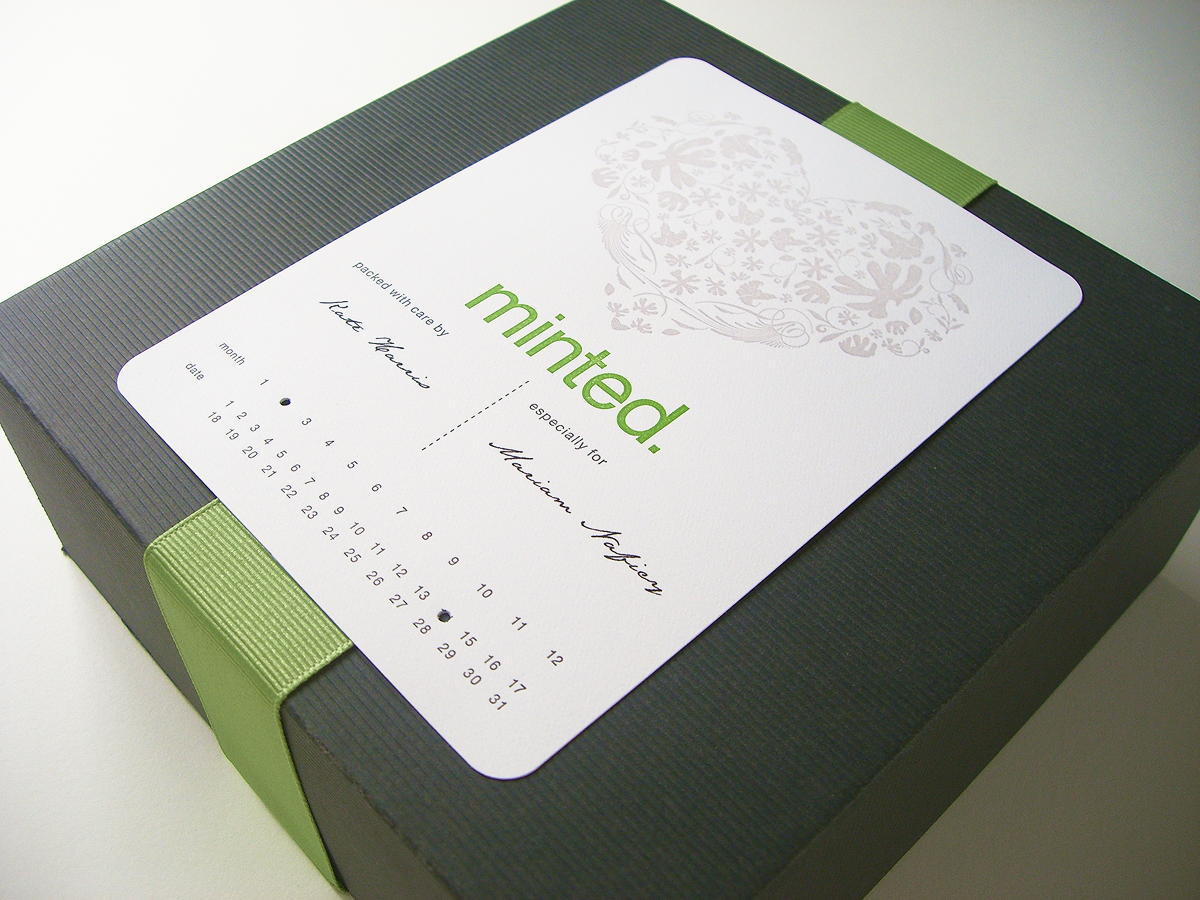 Minted gift box with green grosgrain ribbon and personalized label