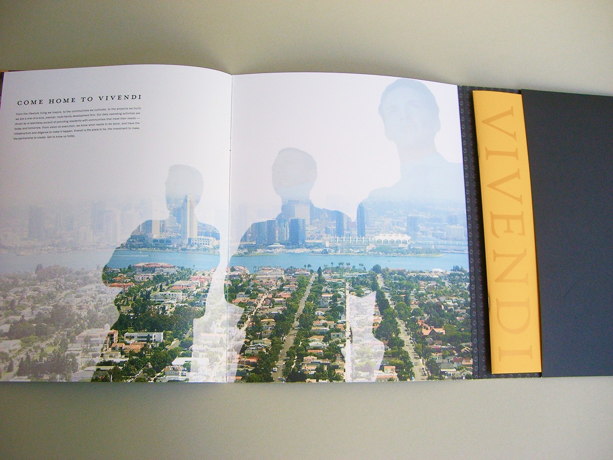 Vivendi Development brochure spread with cityscape and resident silhouettes